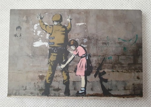 Banksy girl frisking - girl, soldier